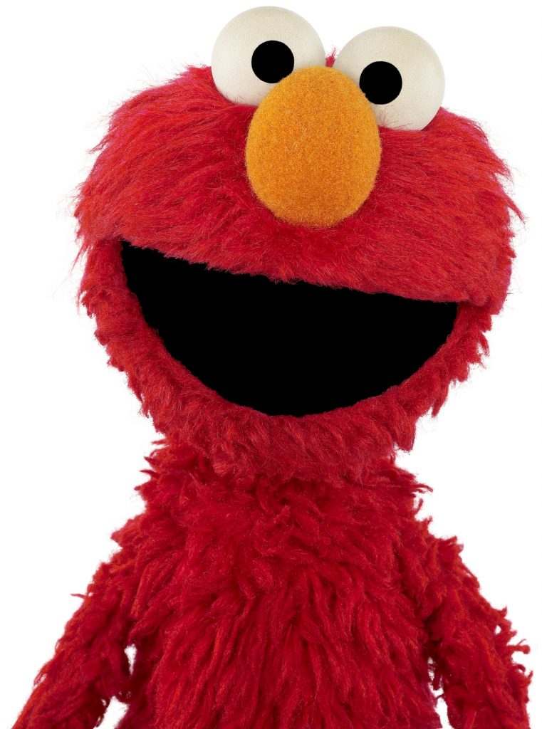 Elmo, standing, 3/4 body pose, facing forward. 